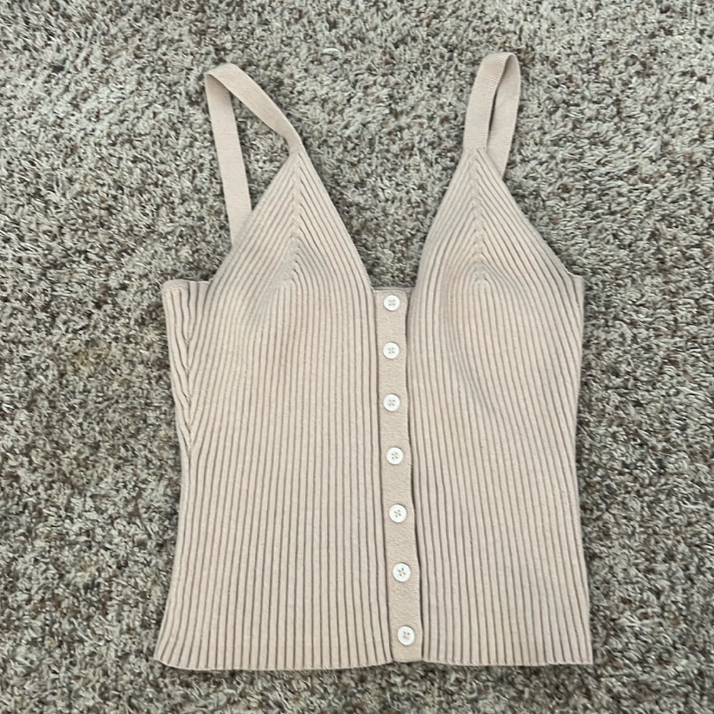 Tan never worn, Arie